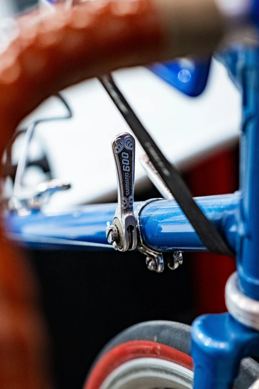 closeup of the front ke of a blue bicycle