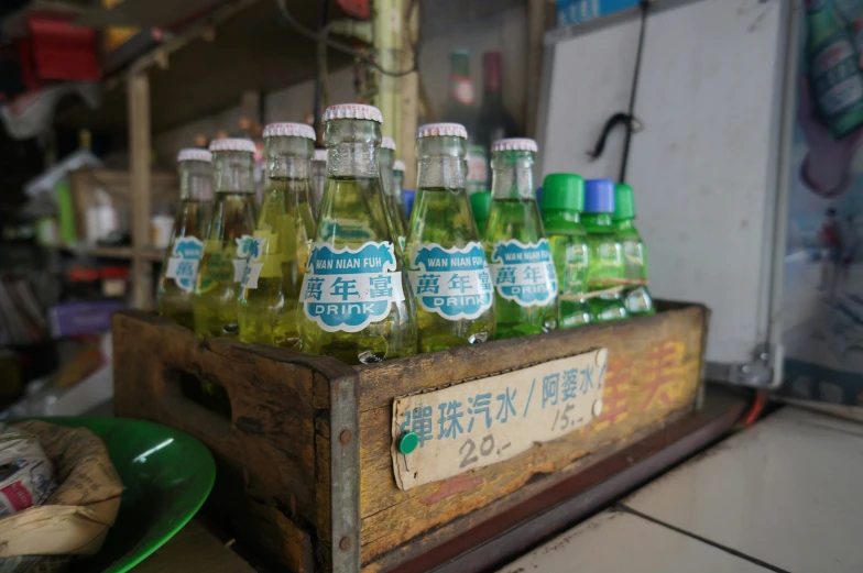 a crate full of bottled beverages is ready to be sold