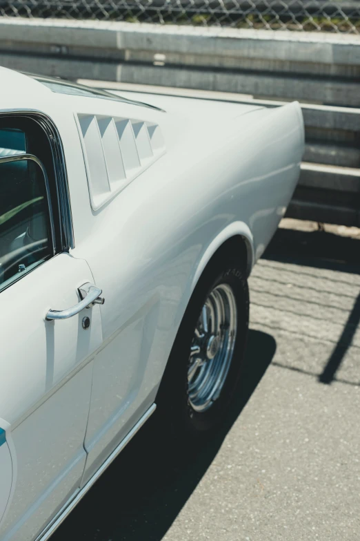 white car with windows, showing the trunk section