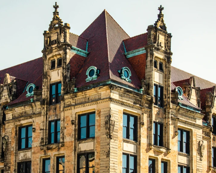 old building with clock tower and windows on clear day