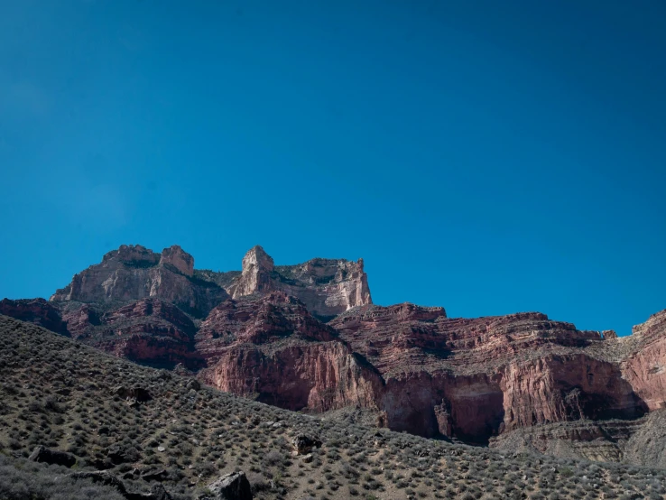 some red rocks and a clear blue sky