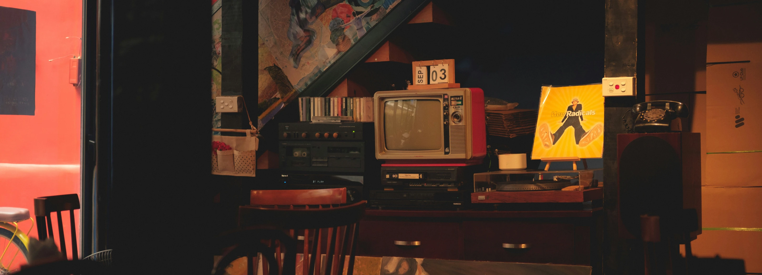 a room filled with old electronic equipment and other items