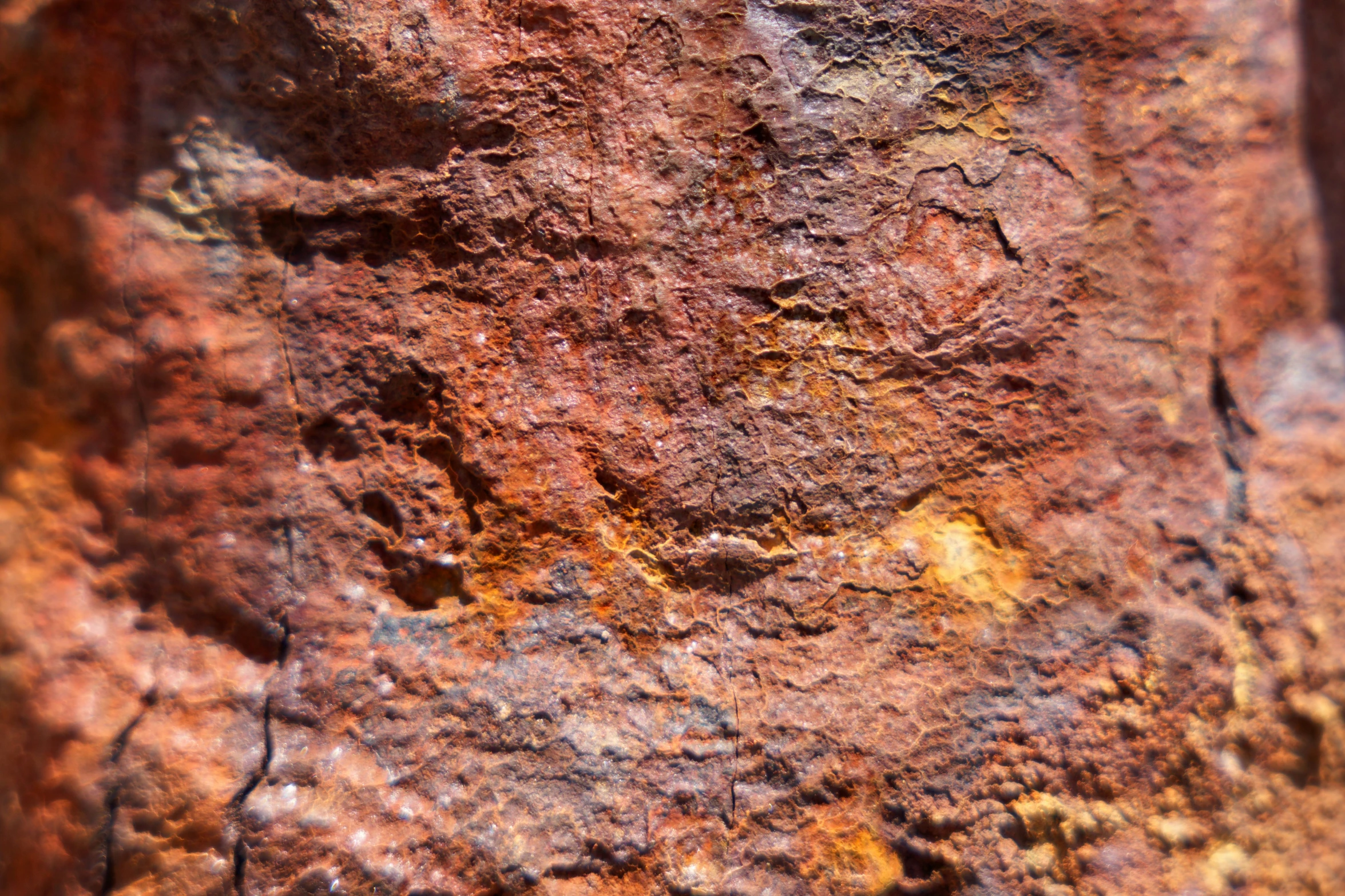 an old, rusted iron plate that seems to have some dirt in it