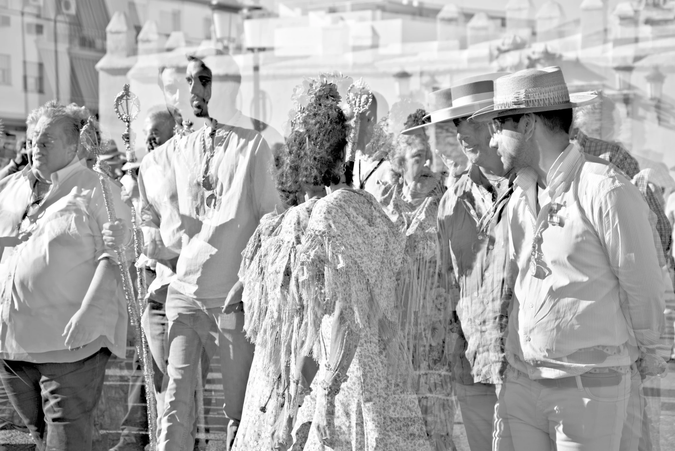 men and women standing together looking off into the distance