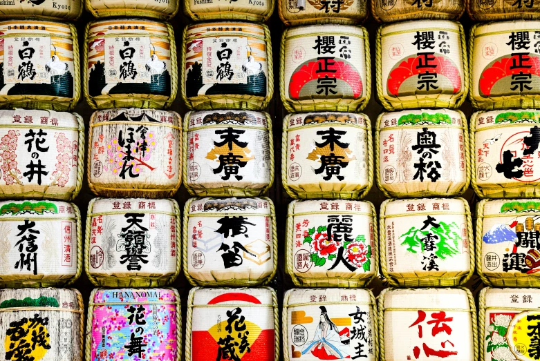 many jars with various asian words in it