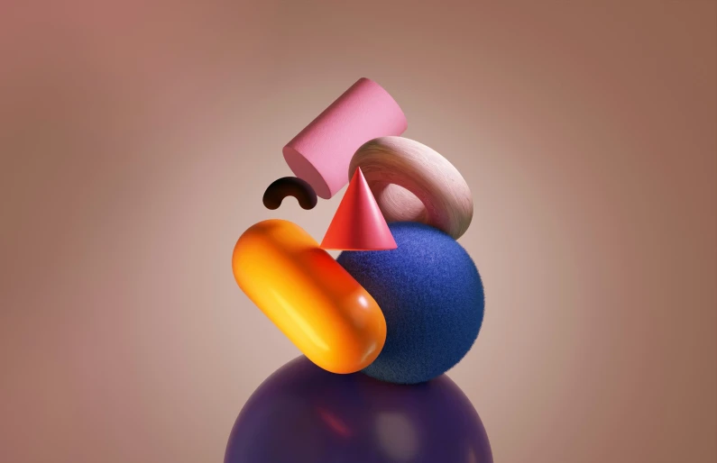a pile of colorful balls and a cone with some pink, orange and blue circles