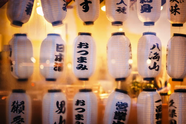 chinese lanterns have been decorated and hanging in rows