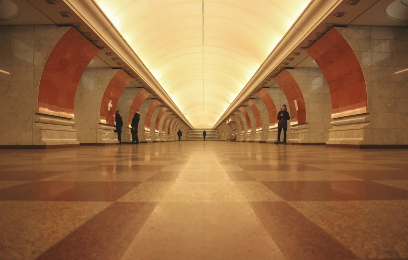 a man standing on the end of a walkway