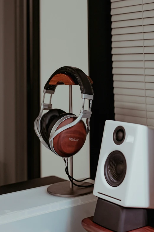 a pair of headphones are on a stand