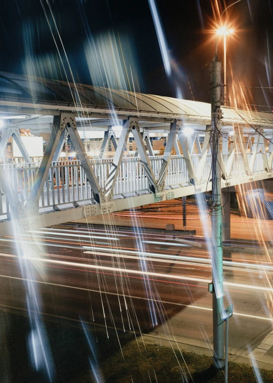 a drawing of a street with traffic passing under it