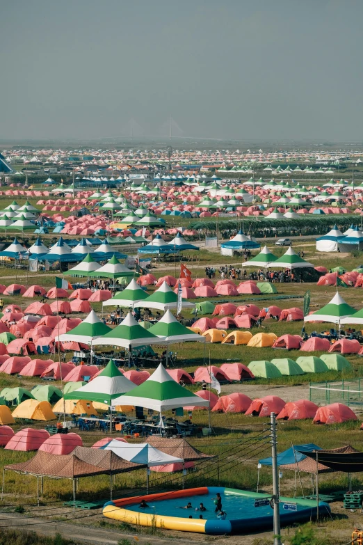 a large field covered in lots of tents