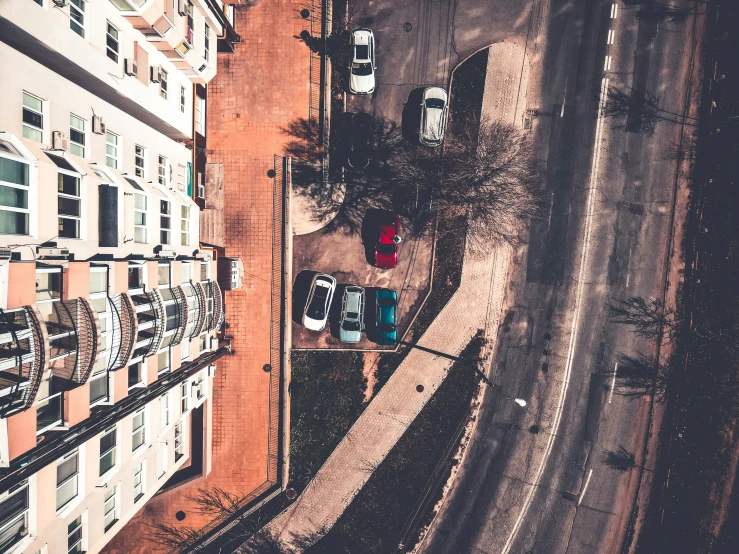 cars parked next to the side of a road