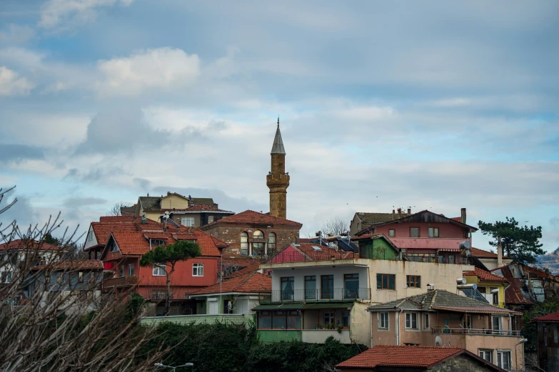 an old city skyline has some type of tower with two tops