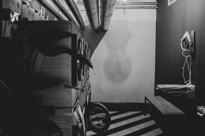 black and white pograph of a bathroom area with the window open