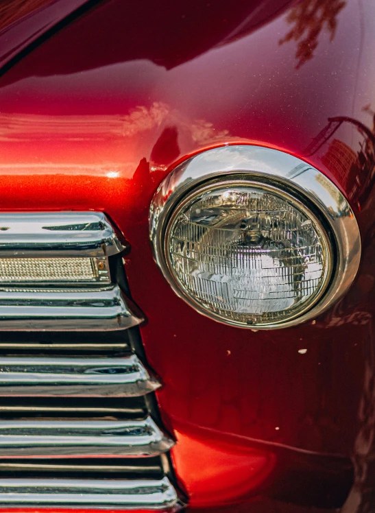 the grill of an older, older classic car