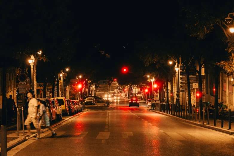 the city street lights are red and white