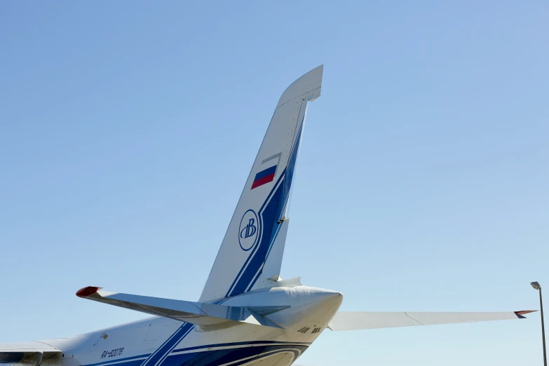 a large jetliner sitting on top of a tarmac