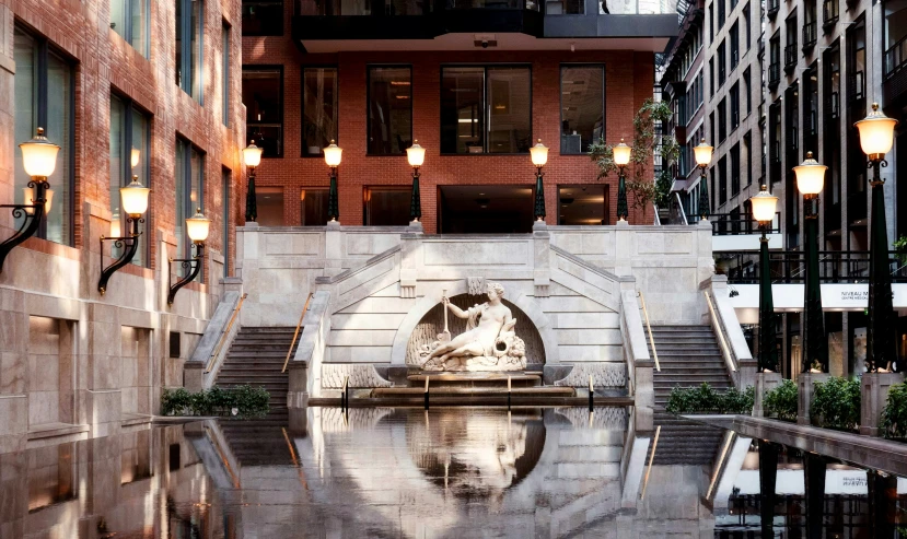 a building and a waterway in the middle of a city