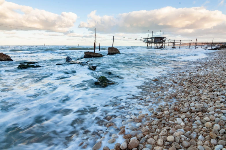 a body of water with several rocky shore lines