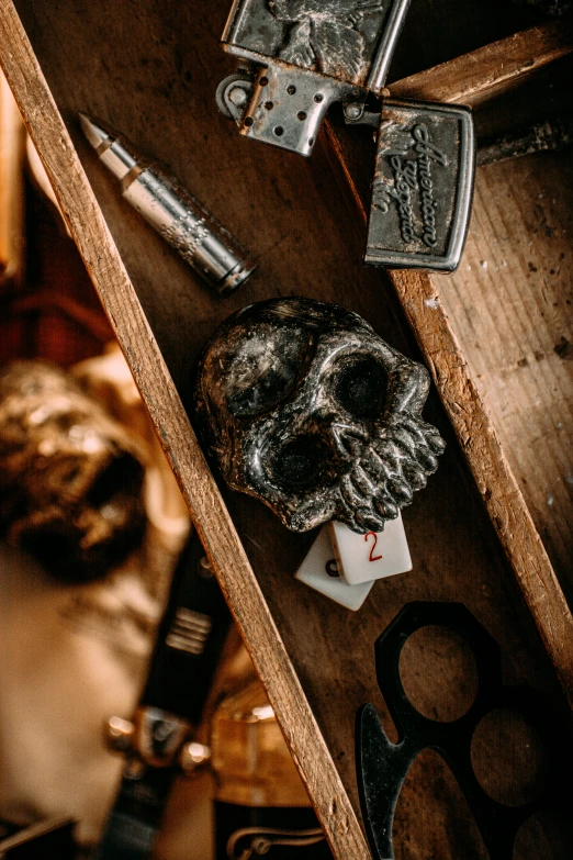 assorted tools and objects are sitting on top of a table