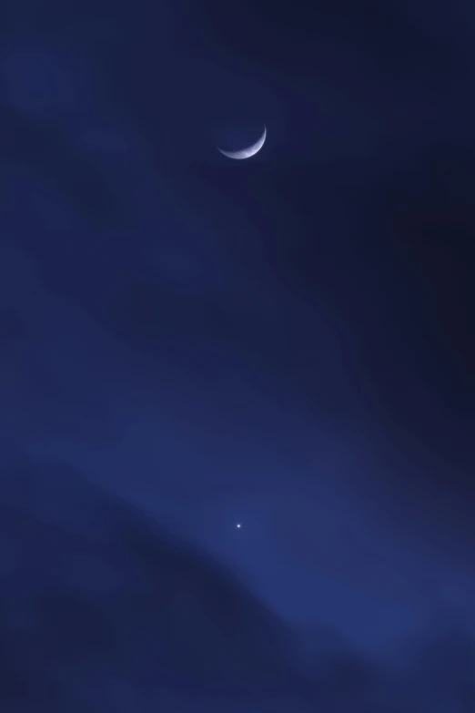 the moon and venus as seen from the sky