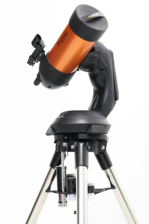 the telescope is positioned to the left with its tripod out
