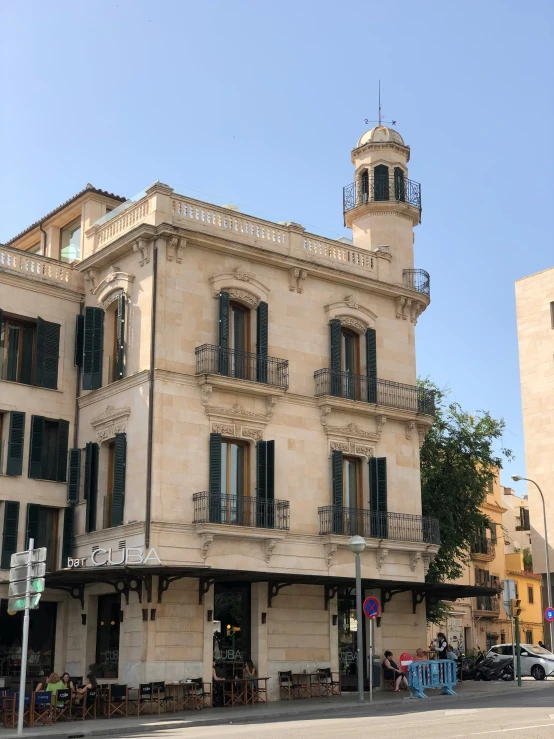 an old building with a tower in front