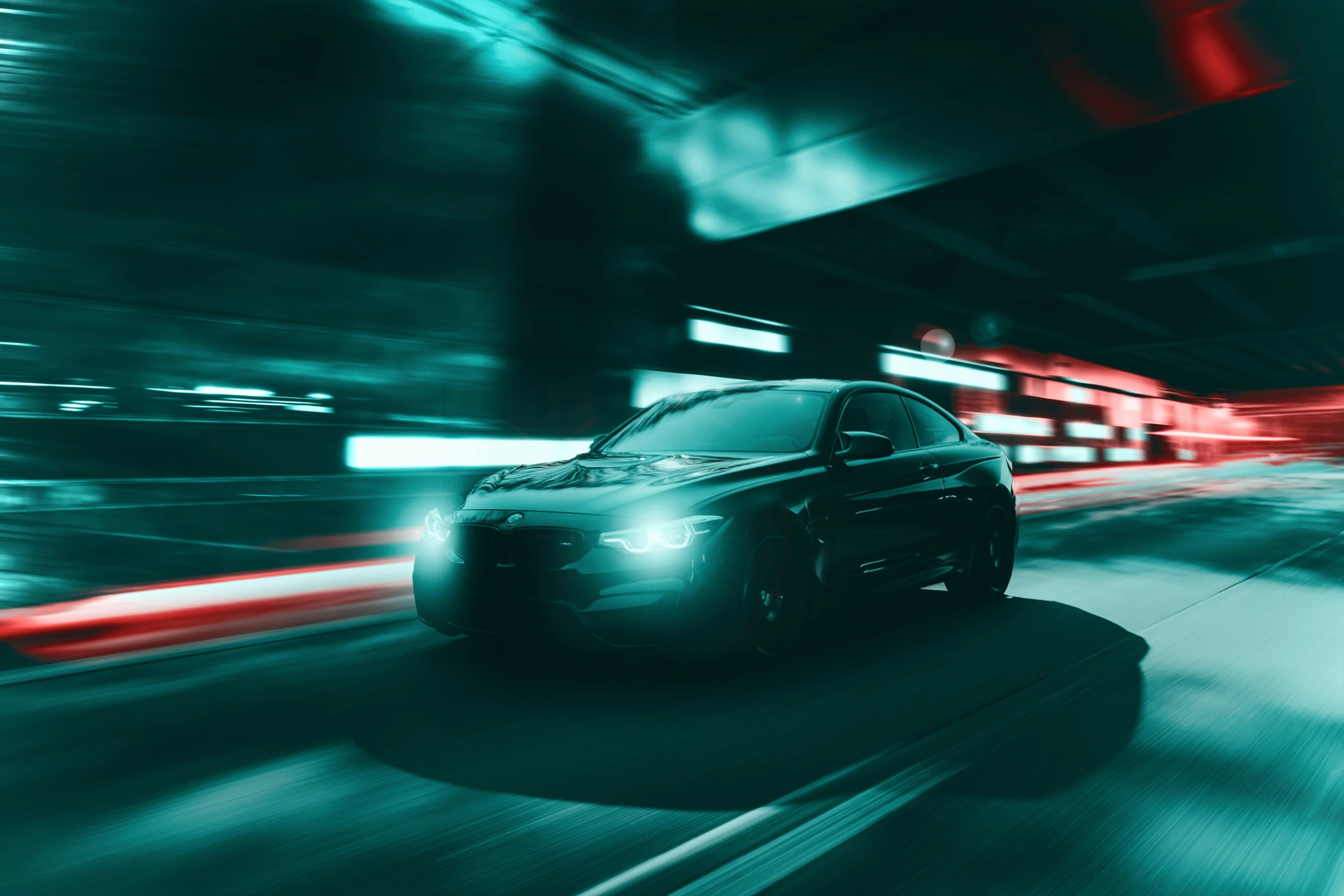 car driving in a tunnel with blurred lights