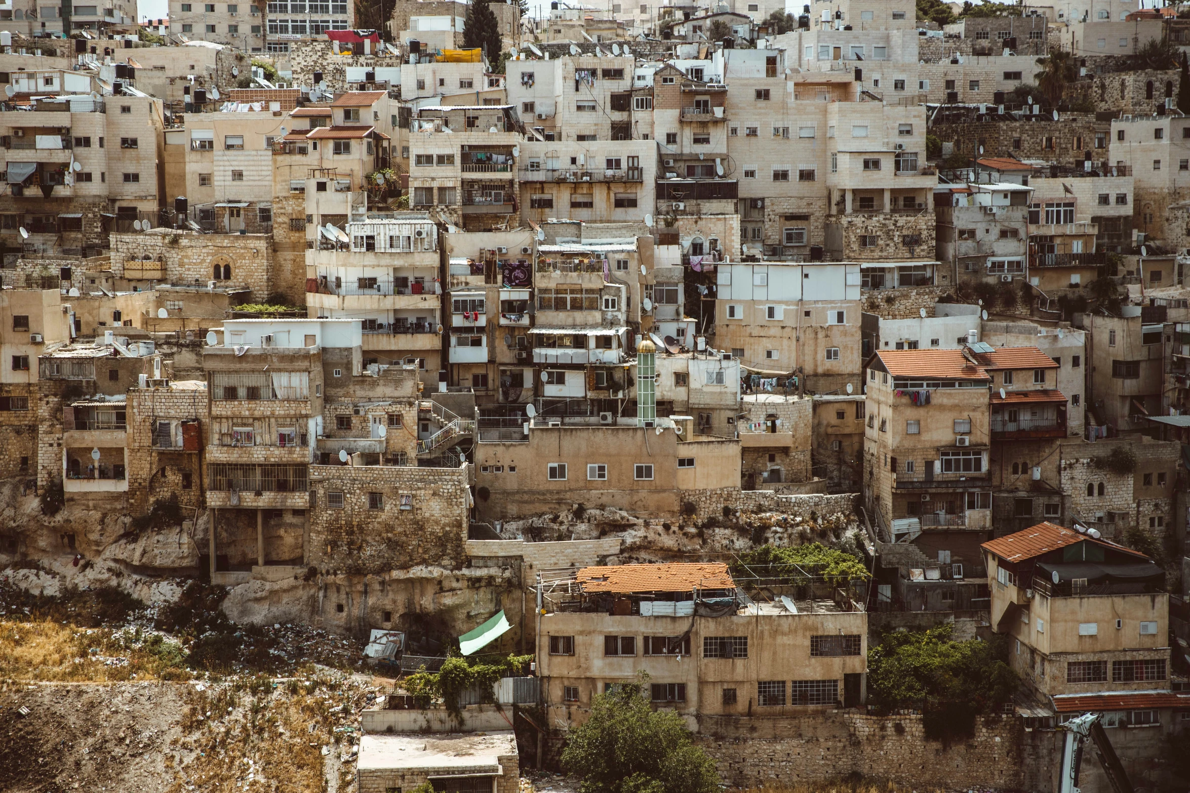 a large group of buildings sit in the city