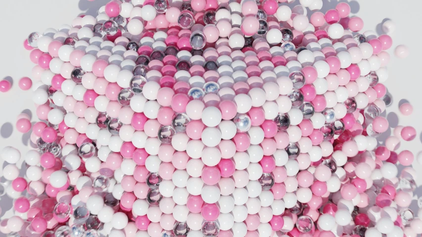 a white and pink surface is covered in plastic bubbles