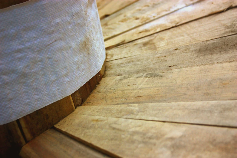 a closeup image of the top and sides of a wooden bench