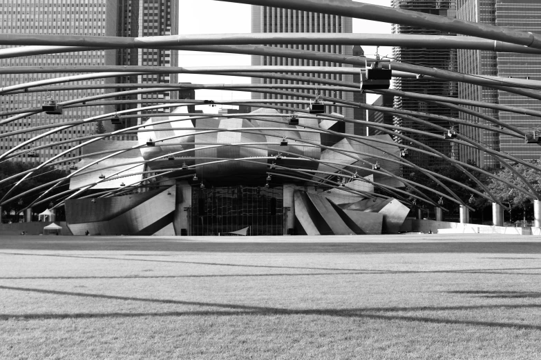 a black and white pograph of buildings along with a bicycle