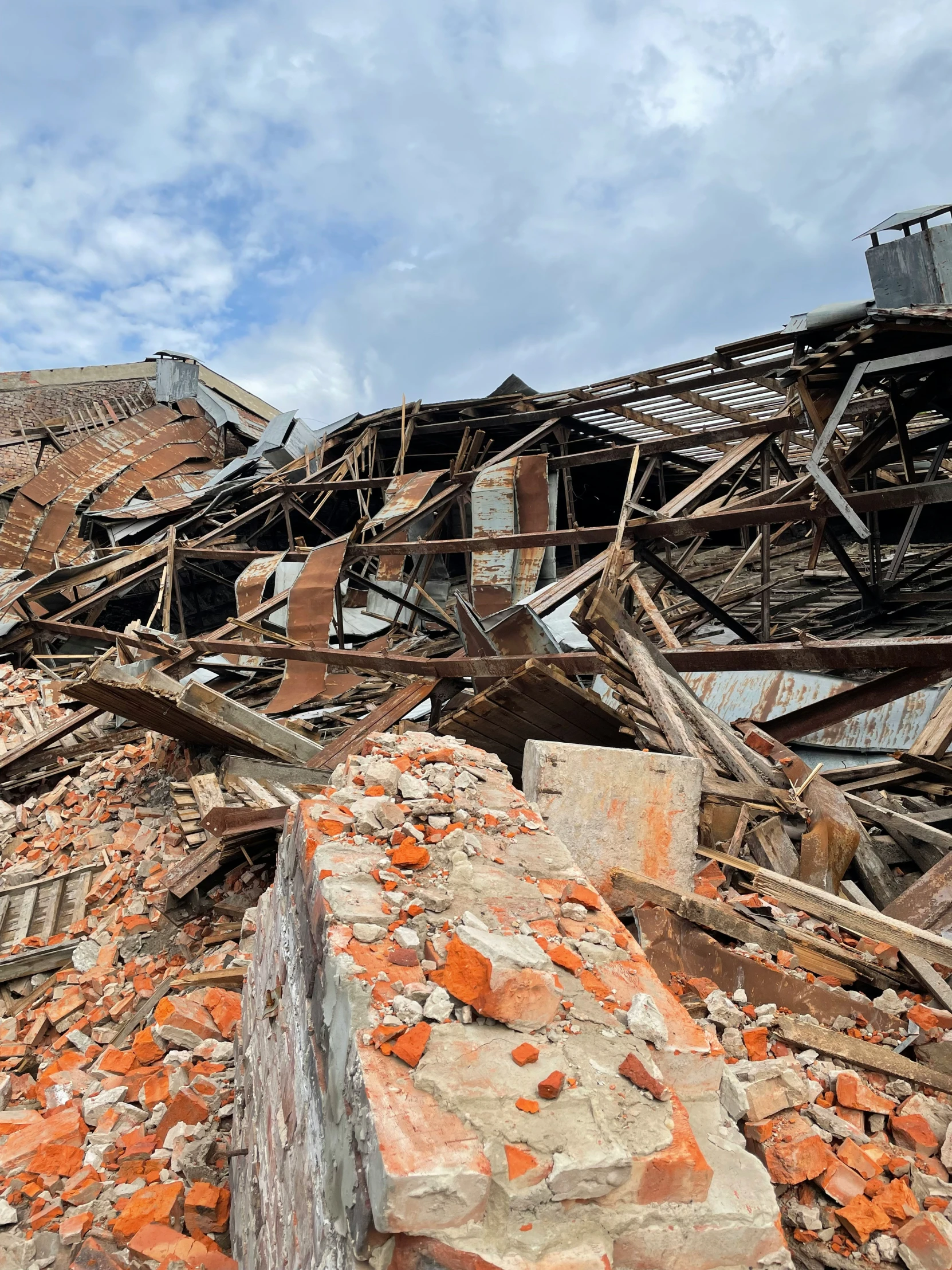 an old building is shown with rubble