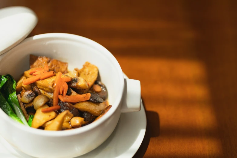 some food and some soup in a bowl