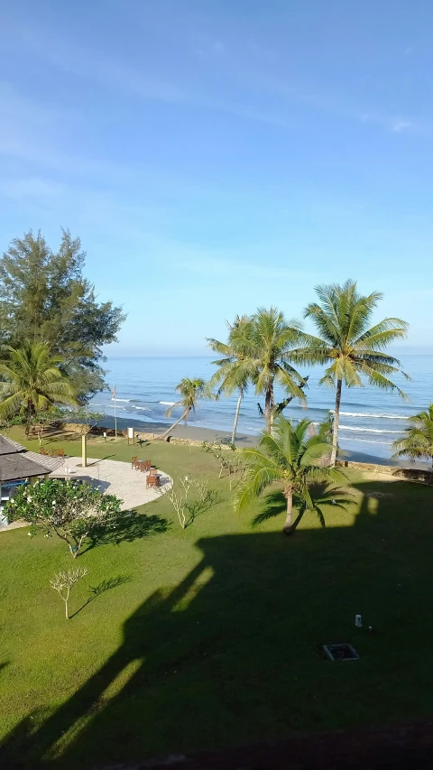 there is a large lawn and umbrella on the beach