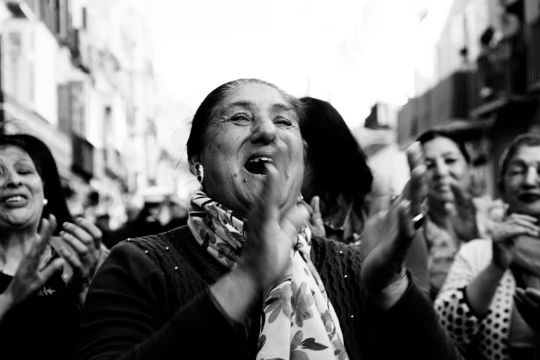 a woman standing in a group of people