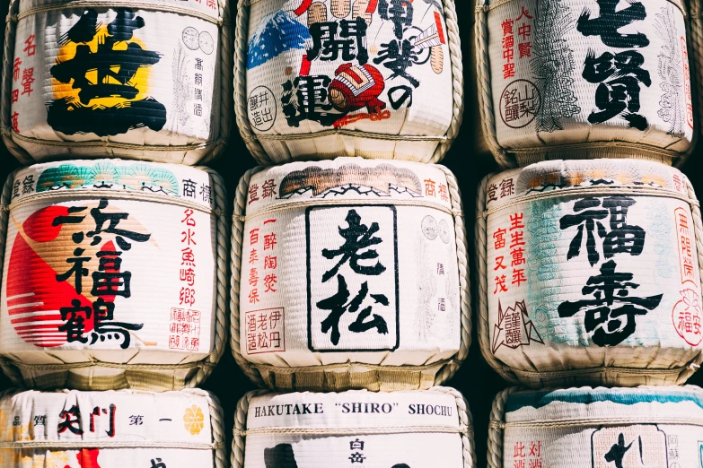 asian rice wrapped up with different types of writing on them