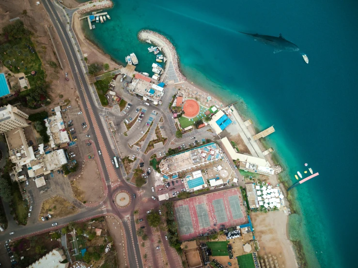 an aerial view of an ocean side town