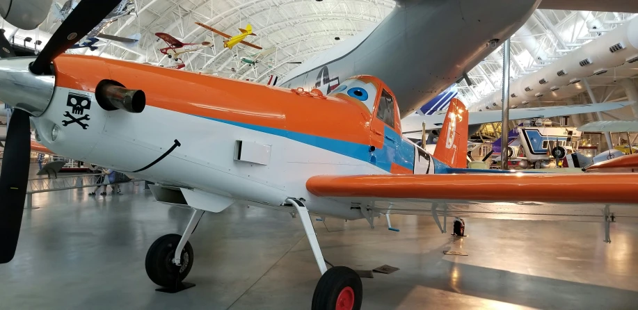 the small engine plane is parked at the airport