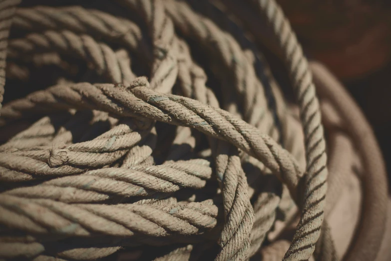 some very large round ropes piled on top of each other