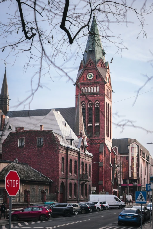 the old clock tower is in a busy city street