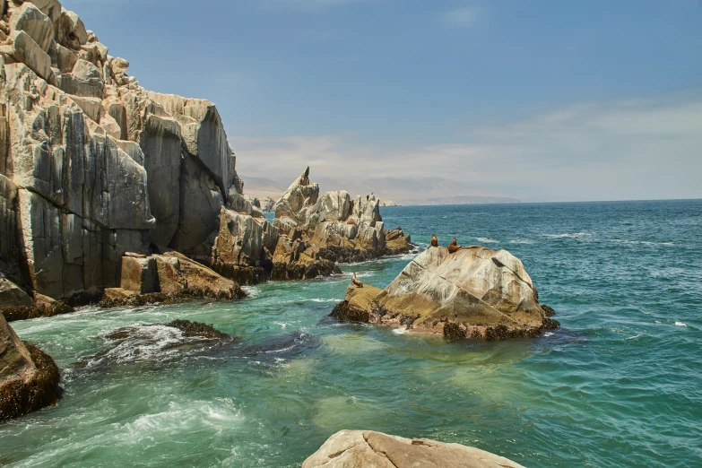 there are some very large rocks in the ocean