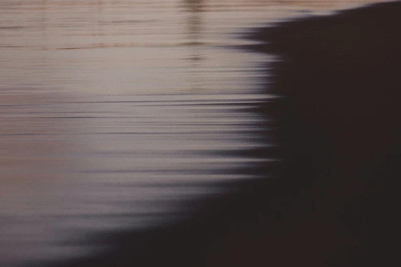 a person standing in the middle of a body of water