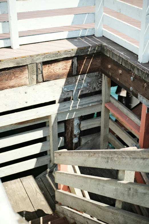 an aerial view of wooden crates that are empty