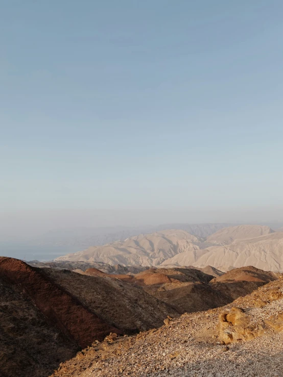 a person standing on the side of a mountain