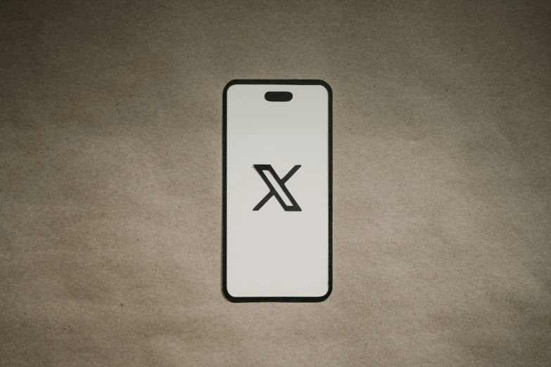 the back side of an iphone case with a thin line x on it