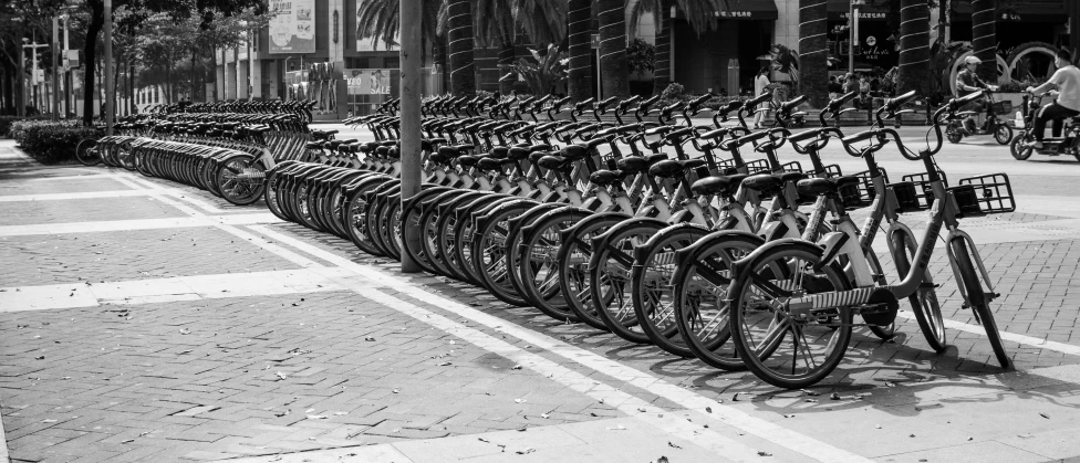 there are many bicycles parked next to the building