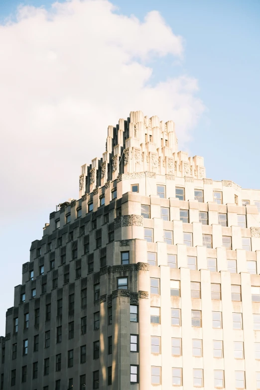 the top of a tall building, and an arrow on the side