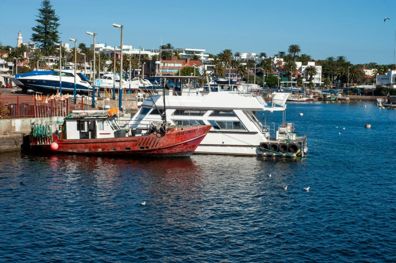 a boat is in the water near a dock