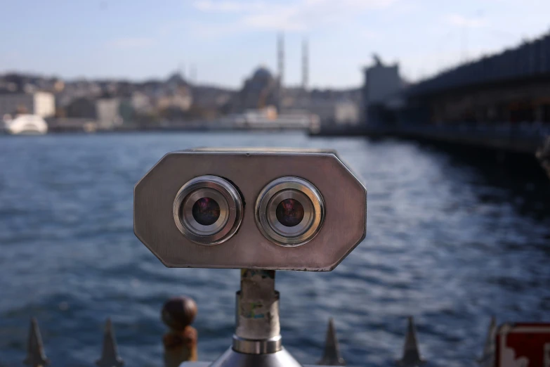 the view from below of a metal object looking at water